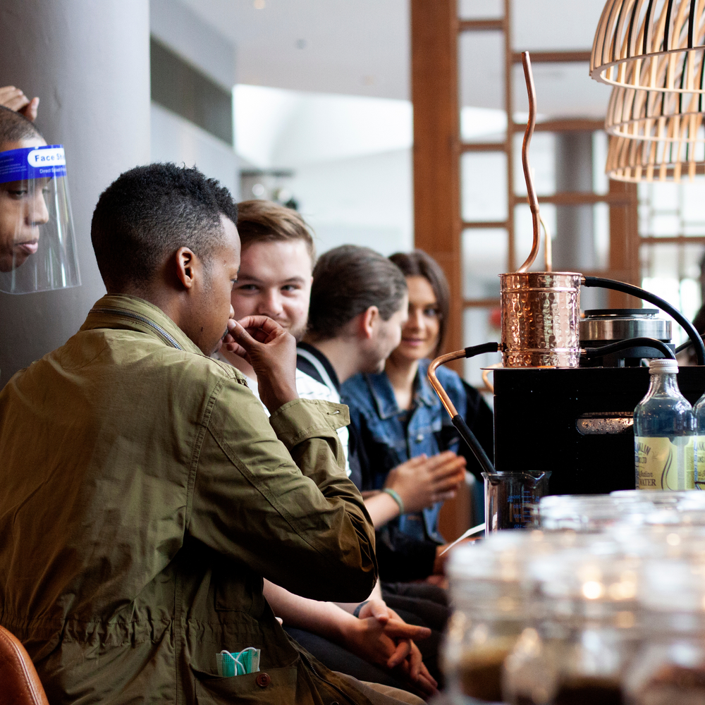 Man smelling botanicals at Nelson's Gin & Vodka School